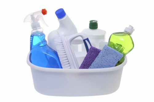 Detailed cleaning of cupboards and kitchen surfaces during a move in clean
