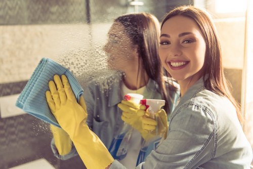 Detailed commercial cleaning in a modern office workspace